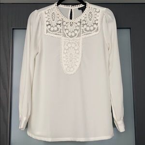 White blouse with lace detail
